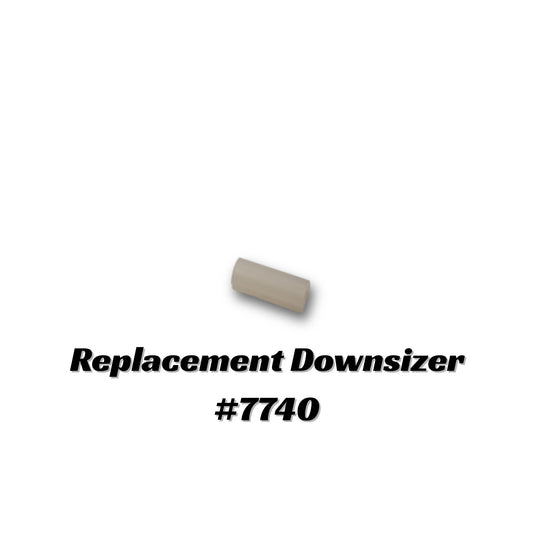 Replacement white plastic  downsizer for CBI adapters part #7740 on a white background